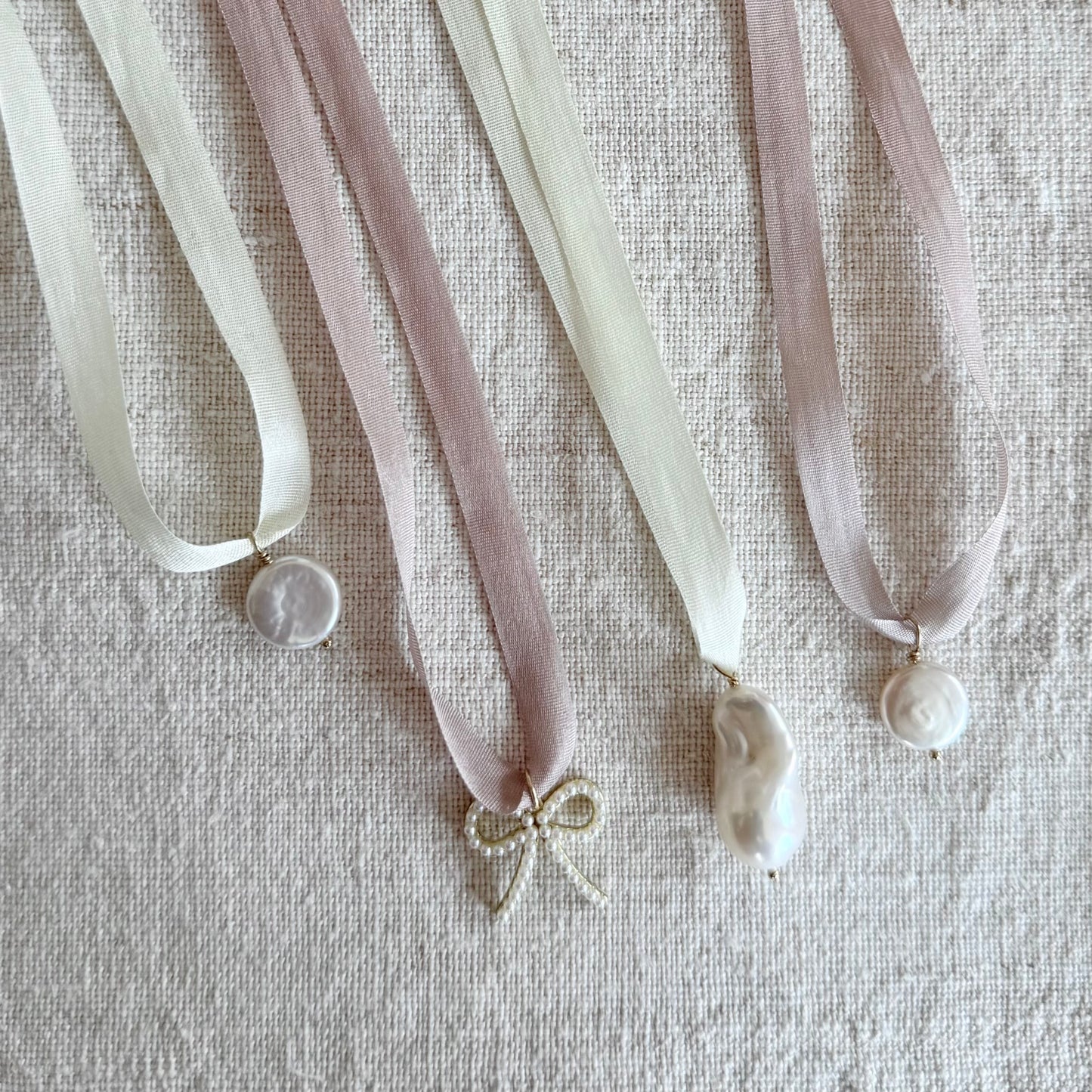 Olivia James Pearl Bow Pendant